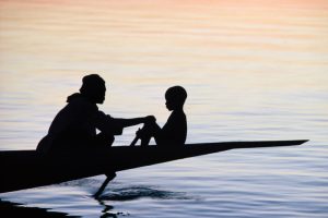 Man and Child in a Boat